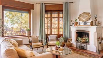Comfort Apartment | Living area | 30-inch TV with satellite channels