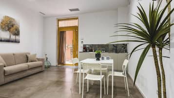Standard Apartment, 1 Bedroom (Apartment) | Living area | 30-inch TV with satellite channels