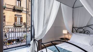 Tabla de planchar con plancha, wifi gratis y ropa de cama