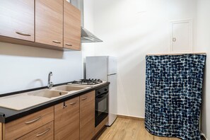 Horno, placa de cocina, utensilios de cocina
