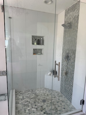 Shower, towels, toilet paper