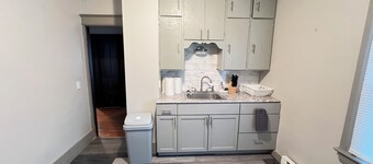 Spacious 4-bedroom apartment in cool Rochester with AC, WiFi, and Onsite Laundry