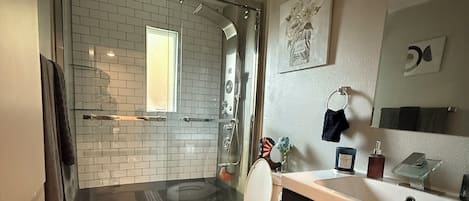 Shower, hair dryer, towels, soap