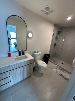 Hair dryer, towels, soap, toilet paper