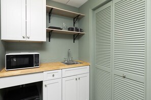 Microwave, coffee/tea maker, cookware/dishes/utensils