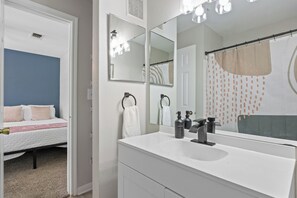 Hair dryer, towels, soap, shampoo
