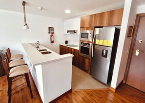 Fridge, microwave, oven, stovetop