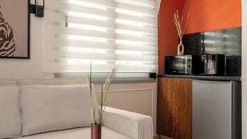 Family Apartment | Private kitchen | Mini-fridge, espresso maker, coffee/tea maker, electric kettle