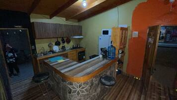 Comfort House, 1 Bedroom | Shared kitchen | Fridge, microwave