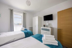 2 chambres, fer et planche à repasser, Wi-Fi, draps fournis
