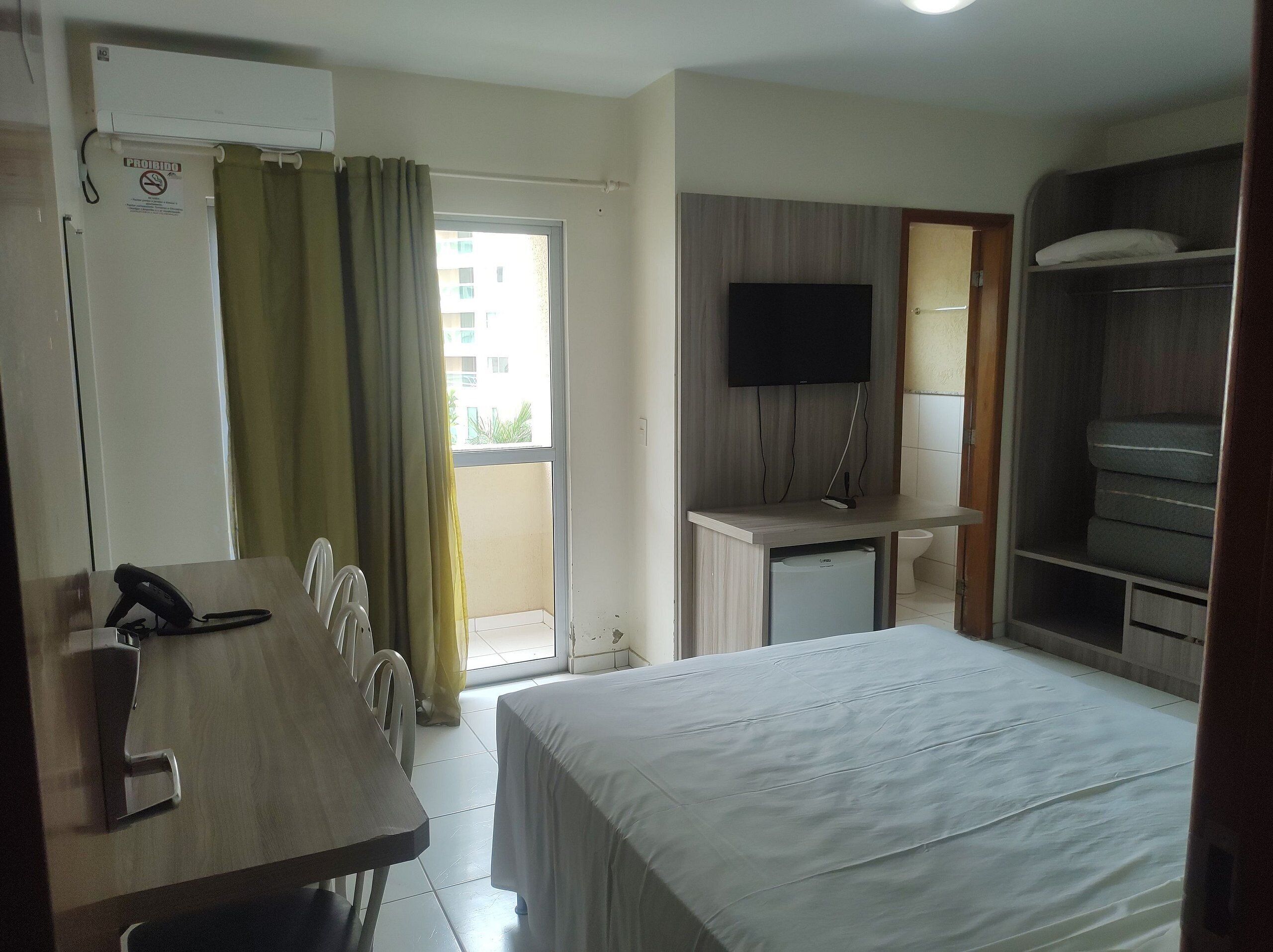 Eenvoudige suite | Verduisterende gordijnen, gratis wifi, beddengoed