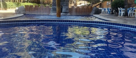 7 outdoor pools, pool umbrellas, pool loungers