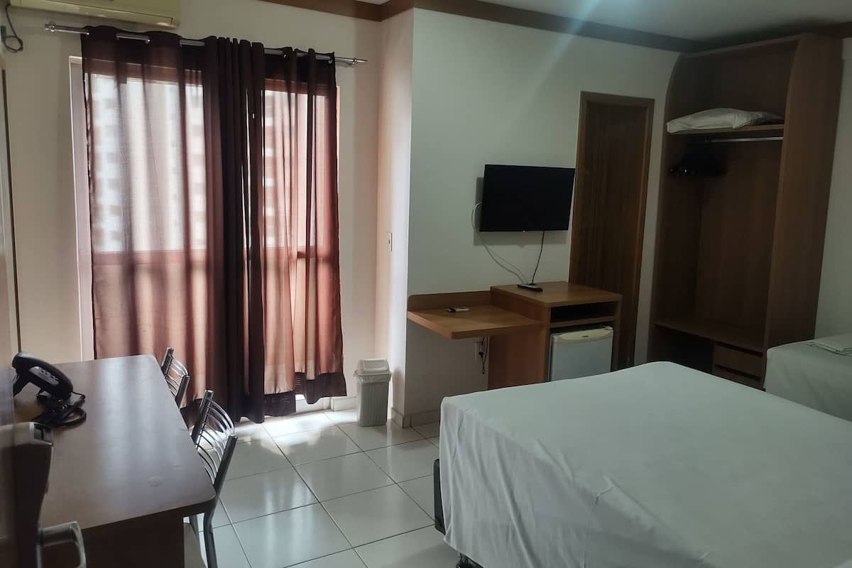 Basic Apartment | Blackout drapes, free WiFi, bed sheets