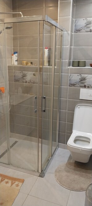 Hair dryer, towels, soap, shampoo