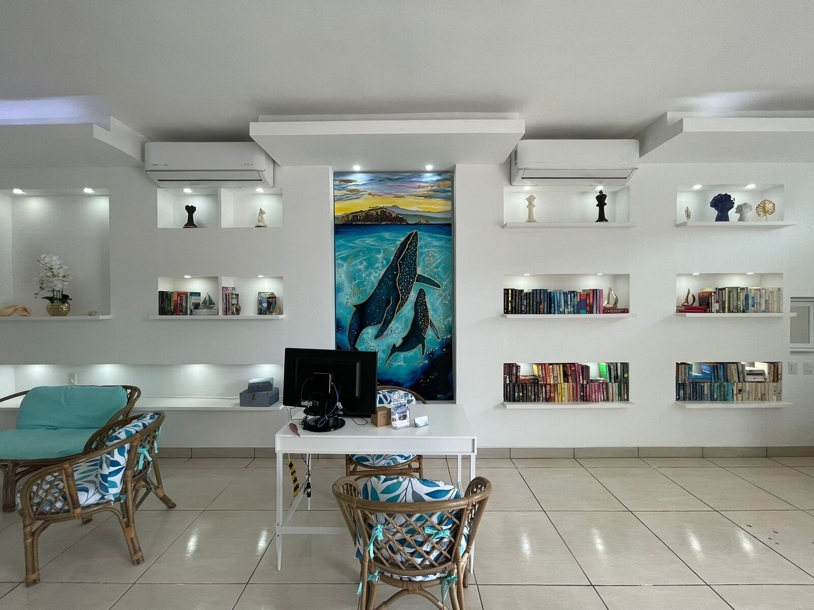 32-inch LCD TV with cable channels, TV, books