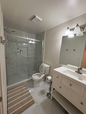 Hair dryer, towels, soap, toilet paper