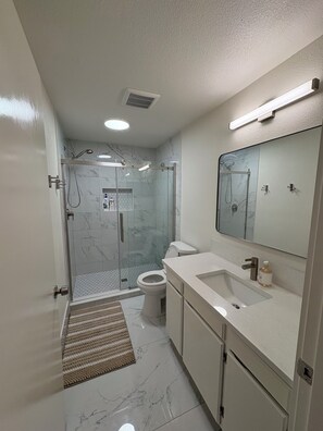 Hair dryer, towels, soap, toilet paper