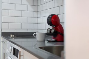 Fridge, microwave, stovetop, coffee/tea maker