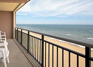 A balcony with a view of the beach and ocean. - Oceanfront Large 2BR/3BA Resort Suite ONE WEEK ONLY July 11-July 18 2026 Kitchen (Virginia Beach)