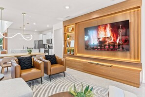 Télévision, cheminée, jeux vidéo