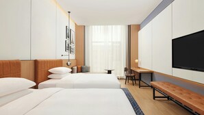 A hotel room with two beds, a desk, a bench, and a TV. - Four Points By Sheraton Xishuangbanna (Xishuangbanna Dai)