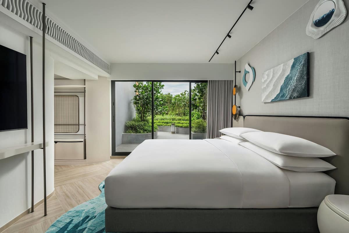 Suite, 1 Bedroom (Private Garden with Jacuzzi) | Minibar, in-room safe, soundproofing, iron/ironing board