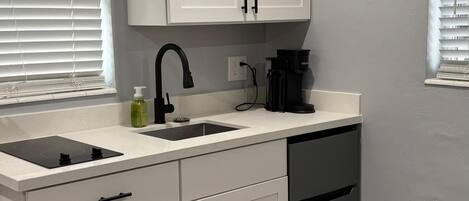 Fridge, microwave, stovetop, coffee/tea maker