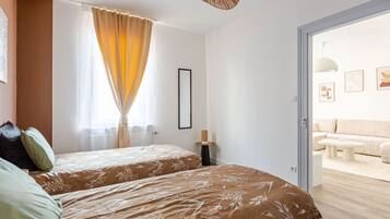 1 slaapkamer, een bureau, een strijkplank/strijkijzer, wifi