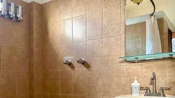 Shower, towels, soap, toilet paper