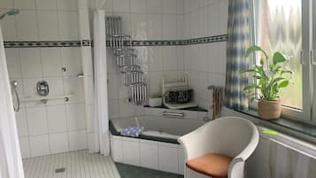 Shower, jetted tub, hair dryer, soap