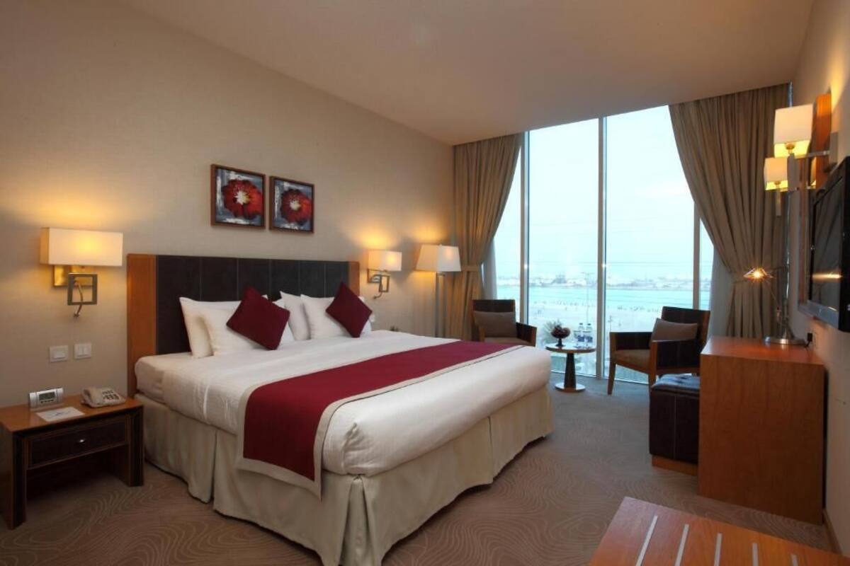 In-room safe, laptop workspace, blackout drapes, soundproofing