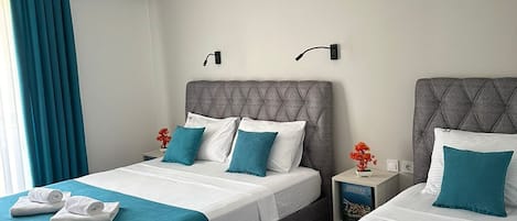 Superior Triple Room, Balcony, City View | Desk, laptop workspace, soundproofing, free WiFi