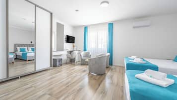 Luxury Quadruple Room, Balcony, City View | Desk, laptop workspace, soundproofing, free WiFi