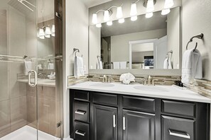Shower, hair dryer, towels, soap - Modern 5BR/3BA Luxury Home,Movie Nights & Comfort (Evans)