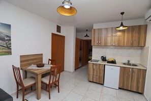 Familielejlighed - balkon - byudsigt | Opholdsområde