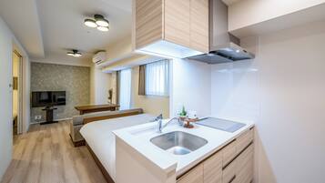 Quadruple Room, Non Smoking, Balcony | Private kitchen | Fridge, microwave, stovetop, cookware/dishes/utensils