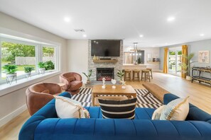 Smart TV, fireplace, video games, foosball