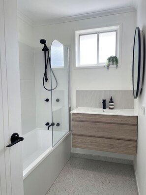 Shower, hair dryer, towels, soap