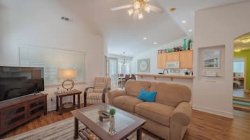House, Multiple Beds, Patio, Garden View (Seabreeze Bungalow) | Living area | Fireplace