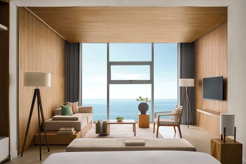 Signature By M Village Beachfront Hotel