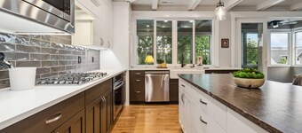 NEW! Peaceful Parkside Escape | High-End Kitchen | Screened Patio | BBQ | Steps to River Greenbelt