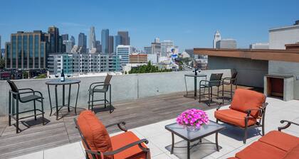 Walkable DTLA Condo w/ Rooftop Views, Coffee Bar, Workstation, Security, & More