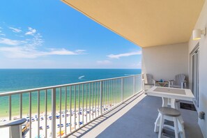 A balcony with a view of the beach and ocean. - Seawind 1502 (Gulf Shores)