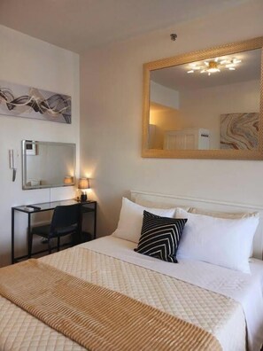 Standard Room, 1 Bedroom | Iron/ironing board, free WiFi - Air Residences (Makati)