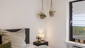 1 habitación, tabla de planchar con plancha, wifi gratis y ropa de cama