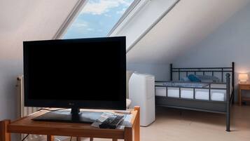 1 Schlafzimmer, BĂŒgeleisen/BĂŒgelbrett, kostenloses WLAN, BettwĂ€sche