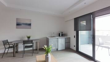 Penthouse Apartment with Balcony | Private kitchenette | Fridge, microwave, electric kettle, paper towels