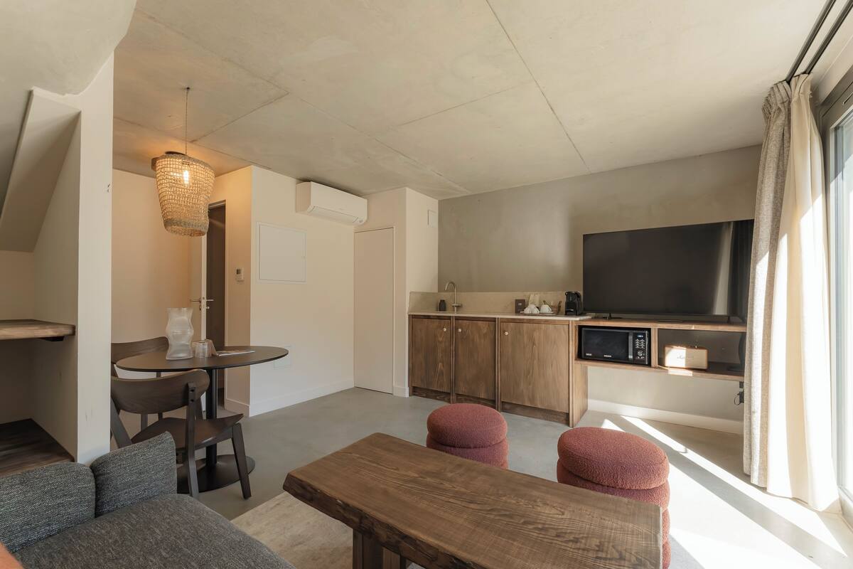 Suite, Garden View | Living area | TV, printers