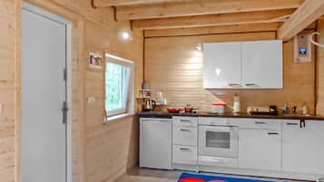 Fridge, stovetop, dishwasher, coffee/tea maker