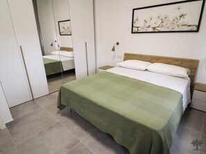 1 habitación, tabla de planchar con plancha, internet y ropa de cama 